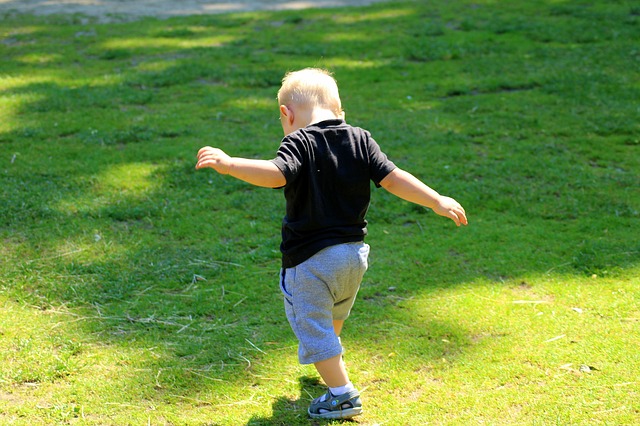child focusing on walking