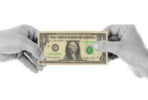 person holding one dollar bill How to Blog and Earn Money