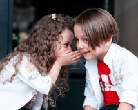 kids sharing a story and laughing