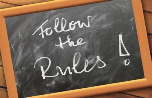 chalkboard with follow the rules